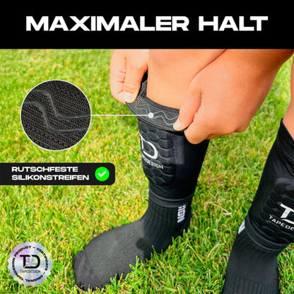 Tapedesign Schienbeinschoner Shinguard Sleeve Kinder, schwarz - machsport